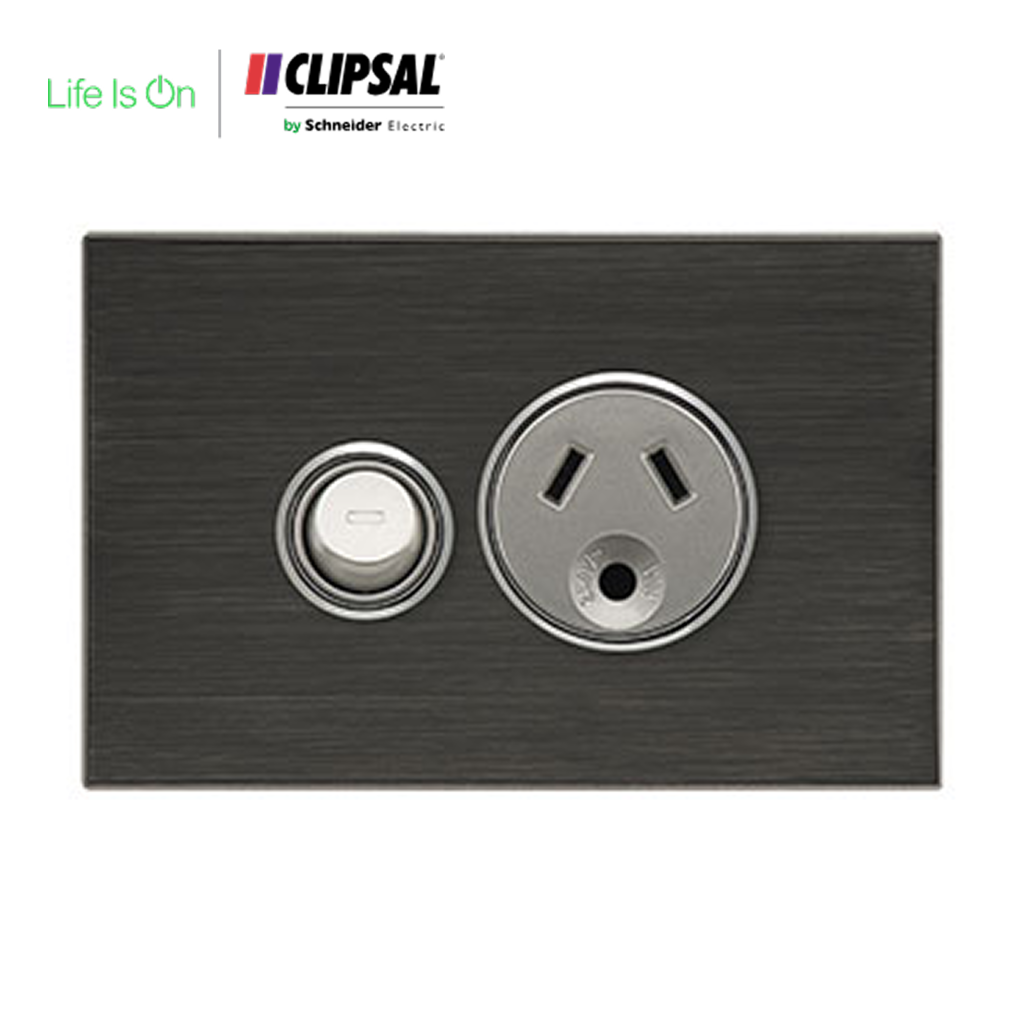 Modern electrical power outlet and light switch on a dark wall plate